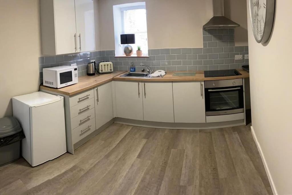 Ferienwohnung Siop Iwan A Menna Caernarfon Exterior foto