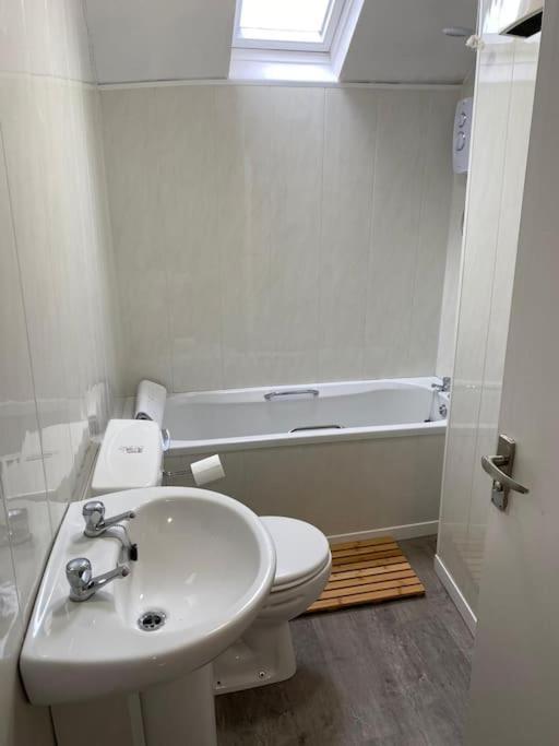 Ferienwohnung Siop Iwan A Menna Caernarfon Exterior foto