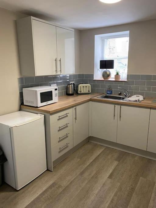 Ferienwohnung Siop Iwan A Menna Caernarfon Exterior foto